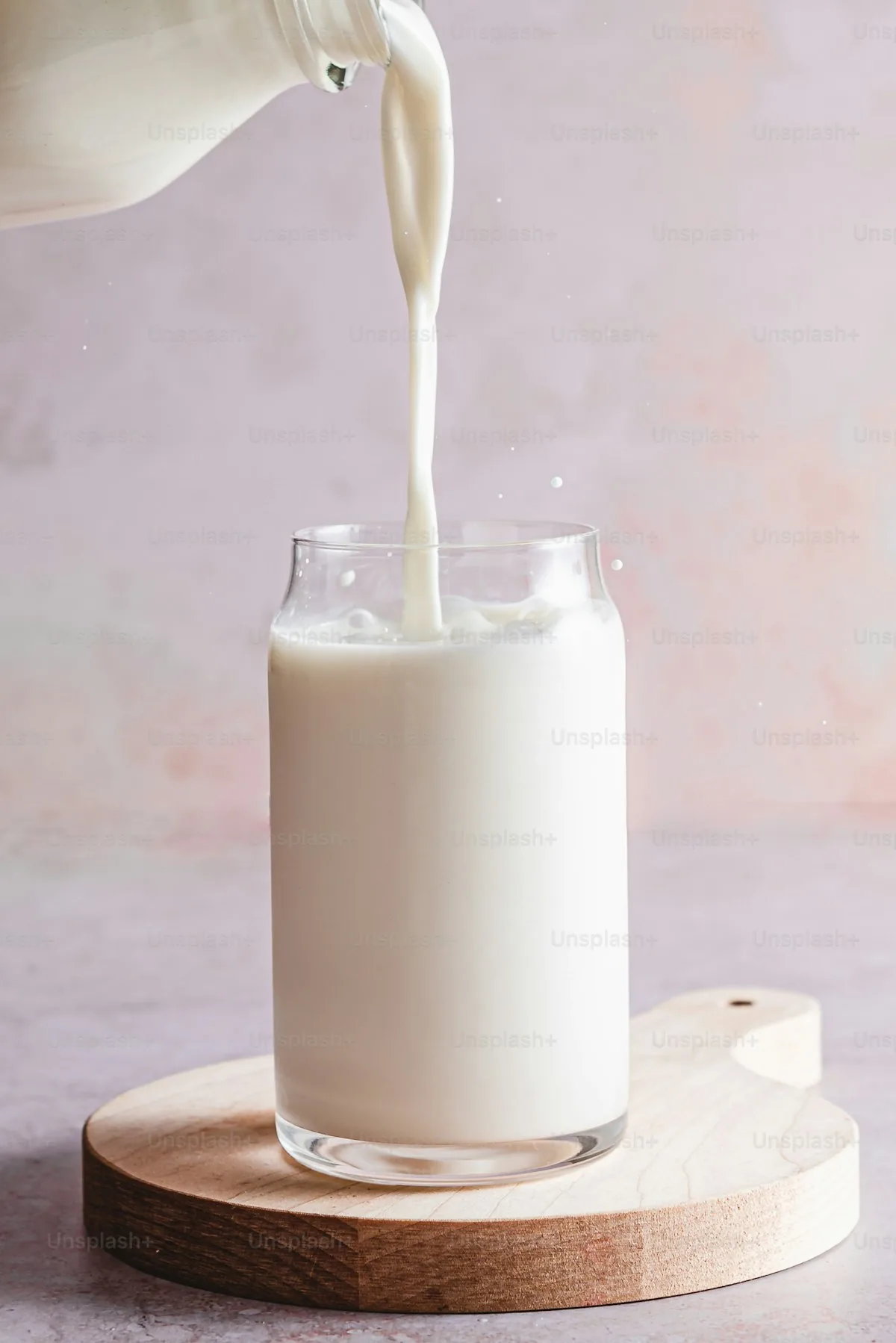 Milk being poured into a glass